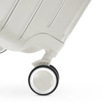 Rueda doble 360° de la maleta GYL Intemporelle arena con grabado del logo GYL en el buje. #couleur_sable