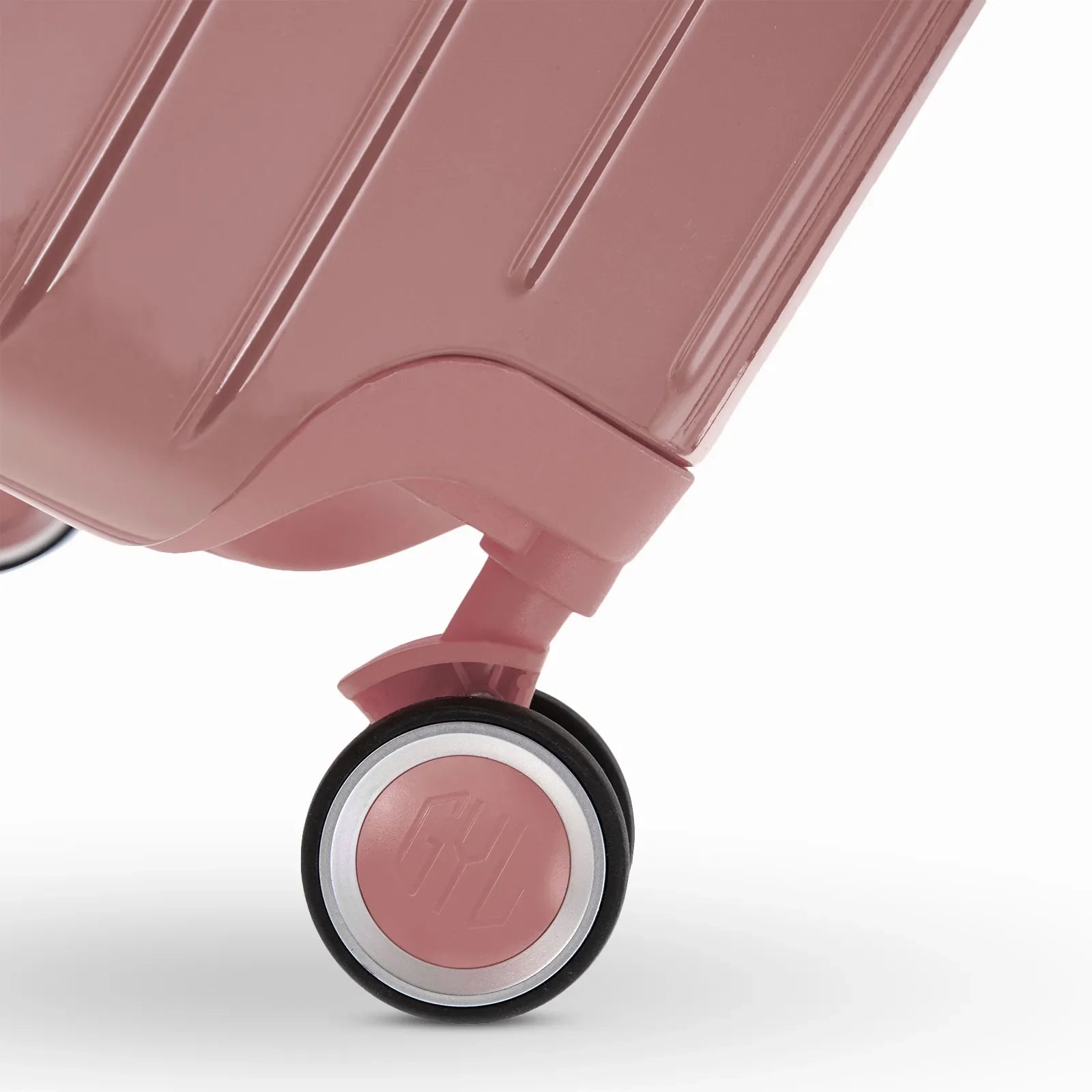 Rueda doble 360° de la maleta GYL Intemporelle oro rosa con grabado del logo GYL en el cubo. #couleur_rose gold