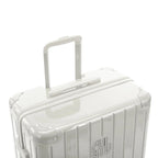 GYL telescopic trolley handle extended on the Intemporelle sand polycarbonate suitcase. #couleur_sable