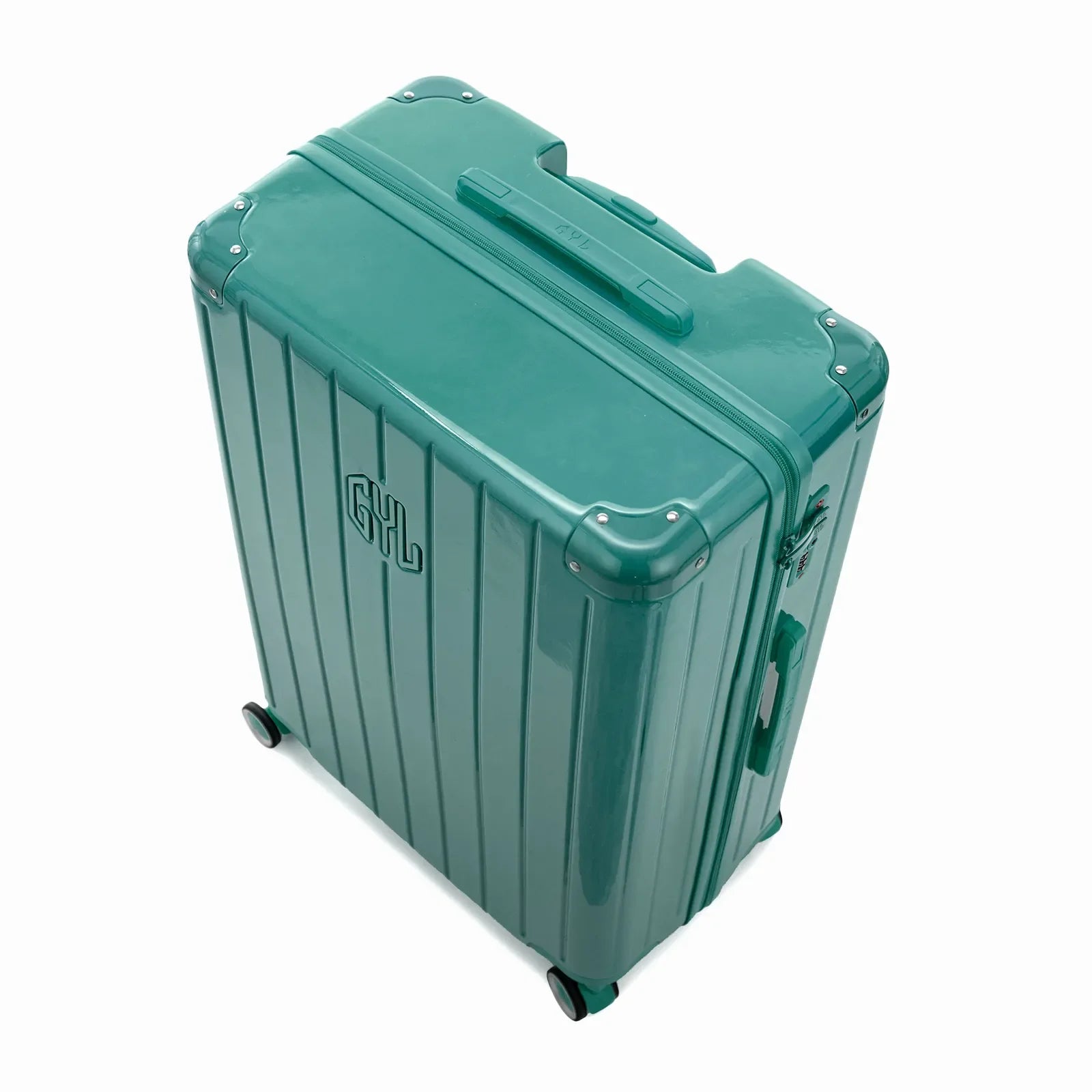 Angled view of the GYL Intemporelle water green hard-shell suitcase with reinforced corners and glossy ribbed shell. #couleur_vert