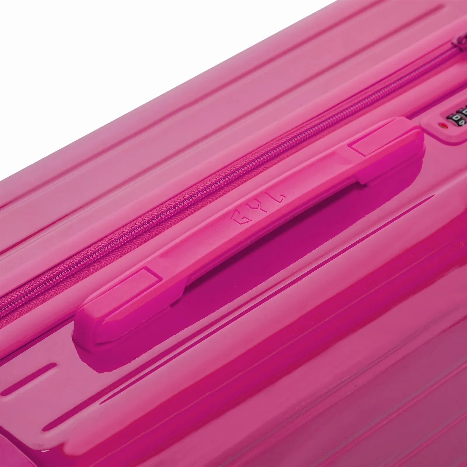 Rigid top handle of the GYL Intemporelle fuchsia suitcase with embossed logo on top. #couleur_fuchsia
