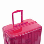 GYL telescopic trolley handle extended on the Intemporelle fuchsia polycarbonate suitcase. #couleur_fuchsia