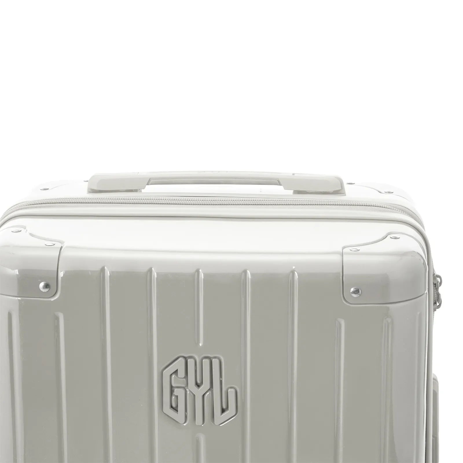 Asa superior rígida de la maleta GYL Intemporelle arena con logo en relieve en la parte superior. #couleur_sable
