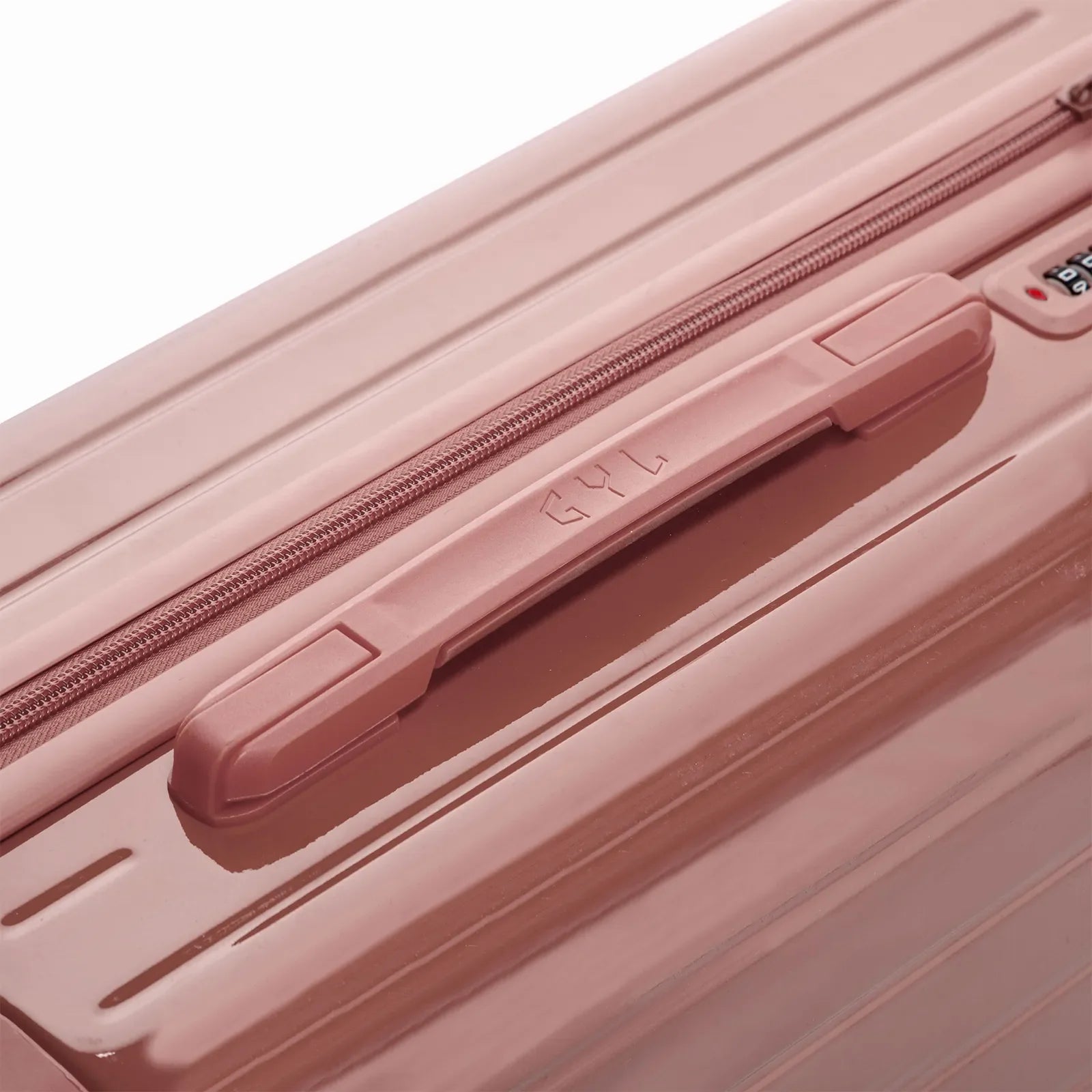 Asa superior rígida de la maleta GYL Intemporelle oro rosa con logo en relieve en la parte superior. #couleur_rose gold