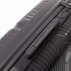 Detail of the side handle and GYL logo on the silver Signature suitcase. #couleur_argent
