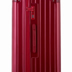 Detail of the TSA lock and side handle on the dark red trunk suitcase. #couleur_red foncé