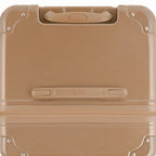 Top view of the GYL trunk suitcase in champagne polycarbonate, with central handle and reinforced corners. #couleur_champagne