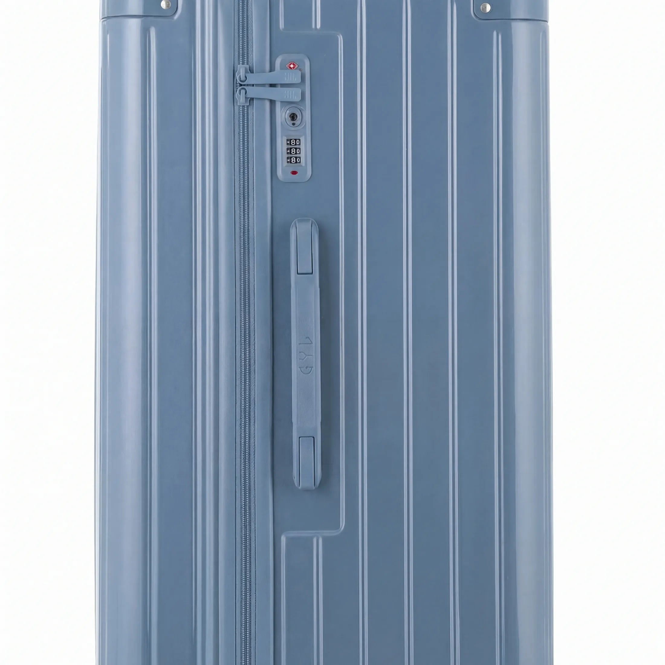 Detail of the TSA lock and side handle on the grey-blue trunk suitcase. #couleur_bleu grisé
