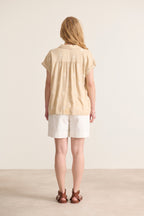 Elegant women's clothing in beige color, sleeveless in embroidery, light and fluid cut, Parisian brand Garance 