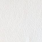 Cester - Djuphäftad sittpuff - Bouclétyg - Beige