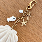 Bijou de sac "Coquillage" acier