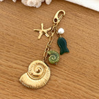 Charm para bolso de acero “Amonita”