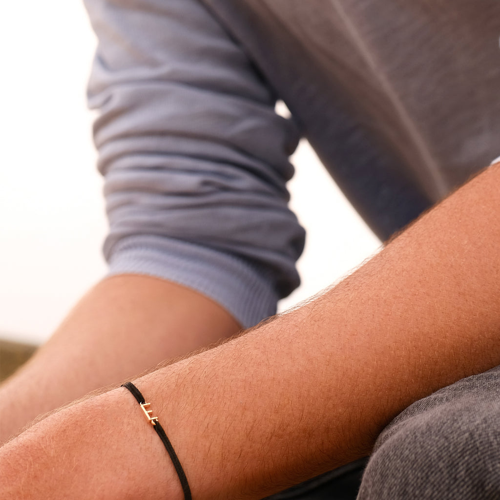 Pulsera E - Oro - Negro