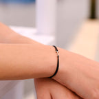 Pulsera T - Oro - Negro
