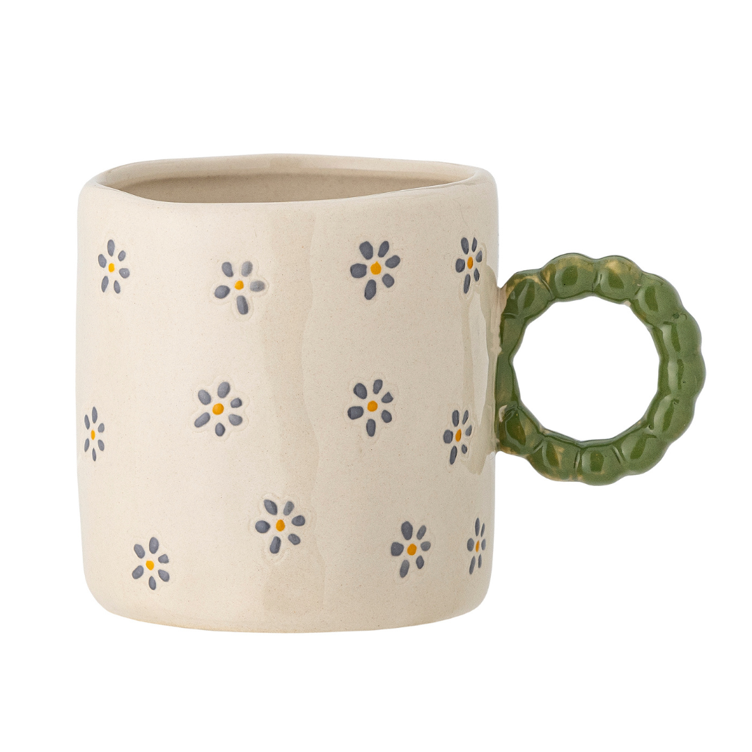 Beige mug with Inside Décor flowers 