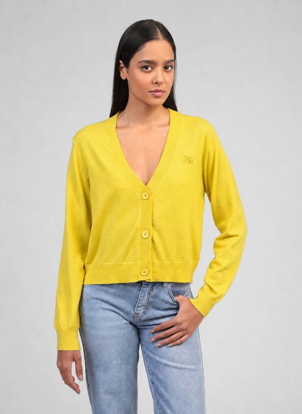 An'ge – Nalidye Cardigan Yellow, model wearing a yellow knitted cardigan, front view