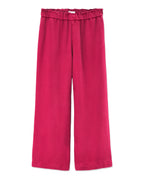 Pantalon femme en tencel rouge cerise, coupe large et fluide avec taille élastiquée pour un confort optimal et un style décontracté.