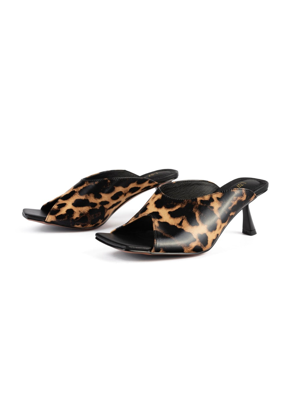 Mules con tacco Turn The World On - Leone