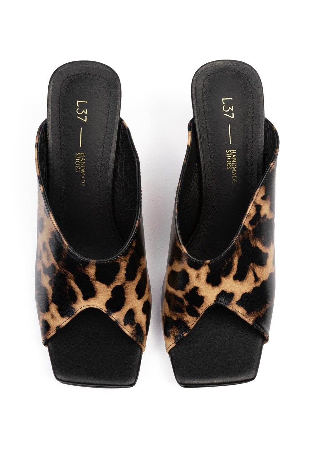 Mules con tacco Turn The World On - Leone