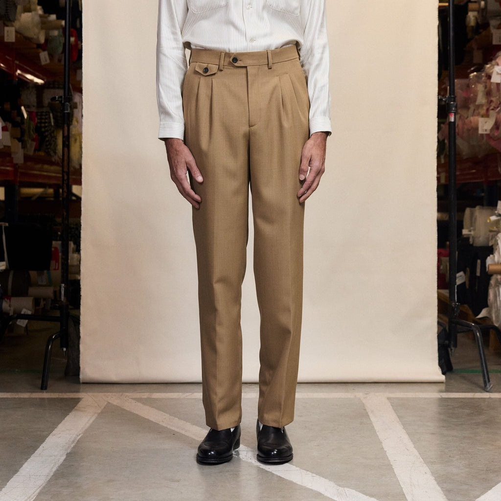 Hast – Camel Double Pleat Virgin Wool Trousers, beige wool trousers, worn by a man, front view
