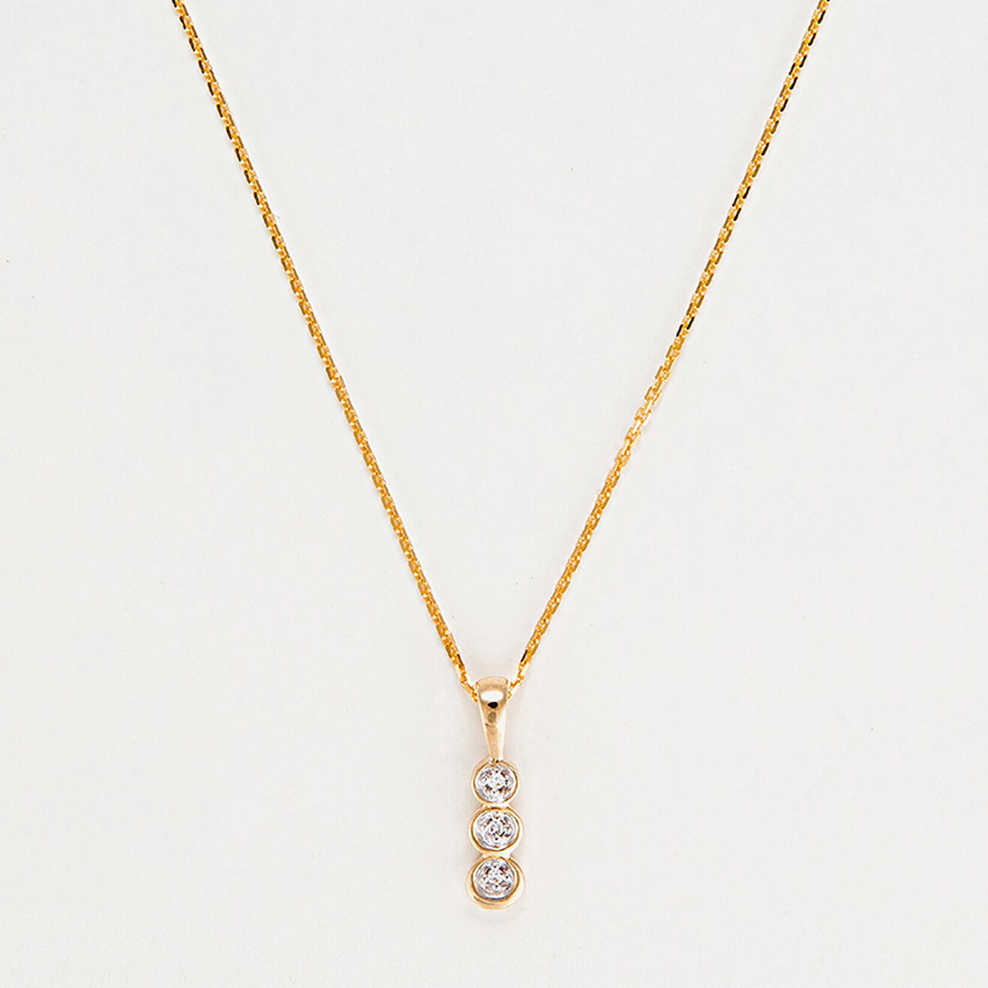 Colgante "Mini Trilogía" D0.02Ct/3 - Oro amarillo 375/1000