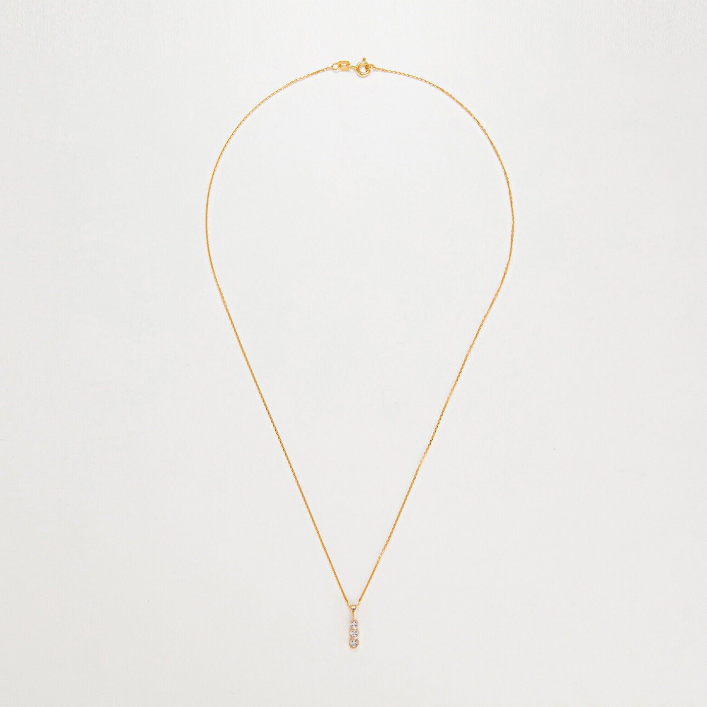 Colgante "Mini Trilogía" D0.02Ct/3 - Oro amarillo 375/1000