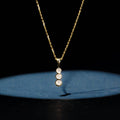 Colgante "Mini Trilogía" D0.02Ct/3 - Oro amarillo 375/1000