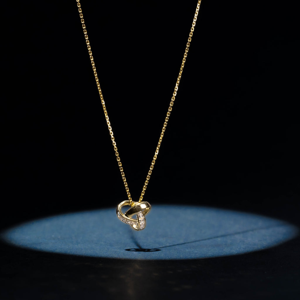 "Elegance Knot" Pendant D0.04Ct/8 - 375/1000 Yellow Gold
