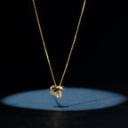 "Elegance Knot" Pendant D0.04Ct/8 - 375/1000 Yellow Gold