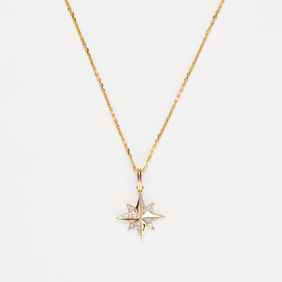 Colgante de Diamantes "Stellina" 0.072/16 - Oro Amarillo y Blanco 375/1000