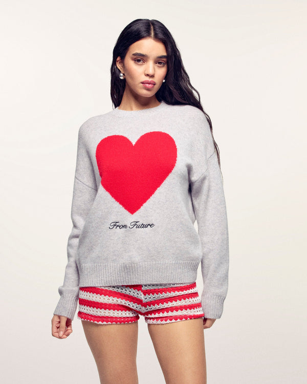 #label: Ehlana mesure 1,77m et porte une taille S