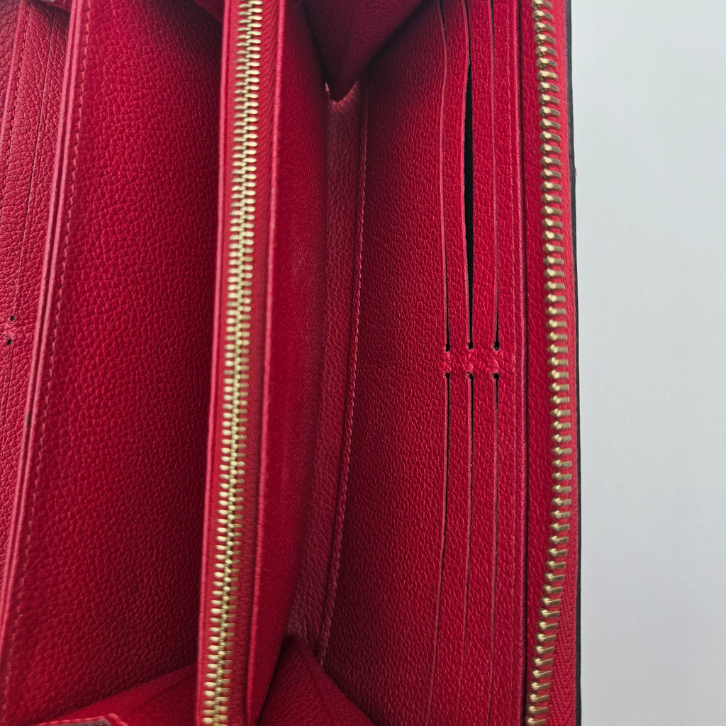 Portefeuille Louis Vuitton Zippy Continental Cuir Empreinte