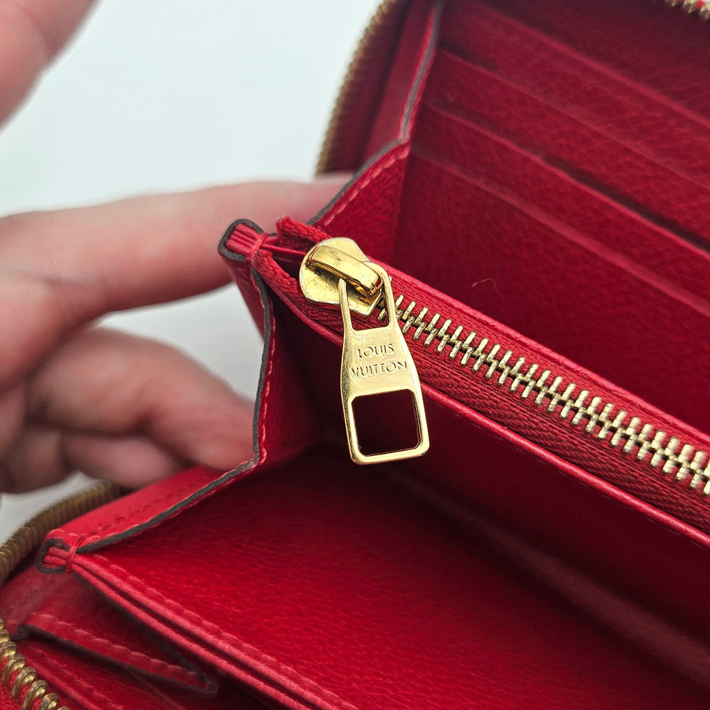 Portefeuille Louis Vuitton Zippy Continental Cuir Empreinte