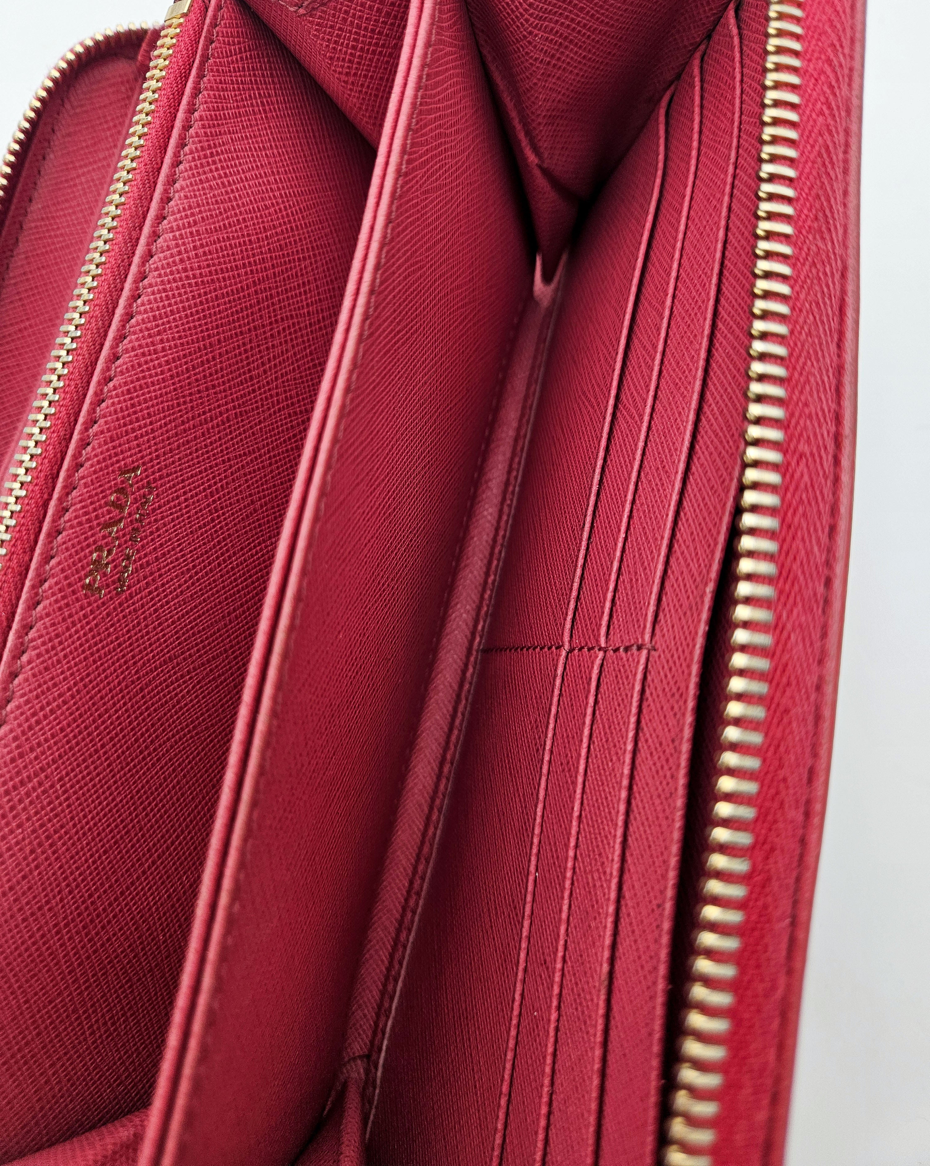 Prada Zipped Wallet In Saffiano Leather