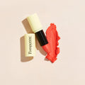 Pomponne natural moisturizing lipstick in coral shade