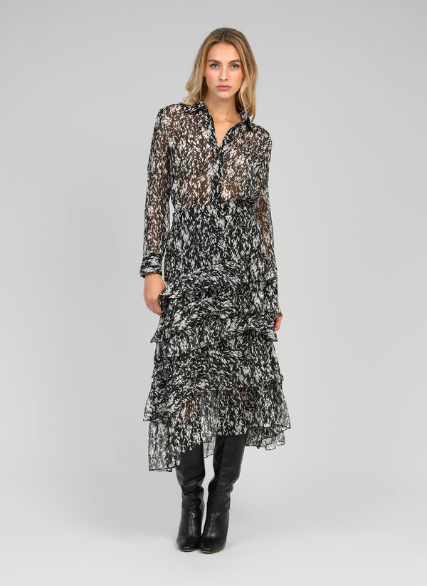 An'ge – Rashely Icare Black Maxi Skirt, model wearing a black and white ruffled maxi dress, front view