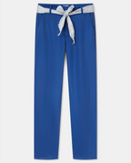Ultramarine blue tencel pants, fitted straight cut, fluid and light material, fabric belt tied at the waist for a casual and feminine style.