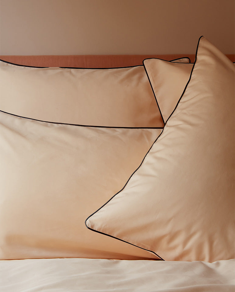Pair of Cotton Percale Pillowcases - Piped Finish - Nude with Black Piping