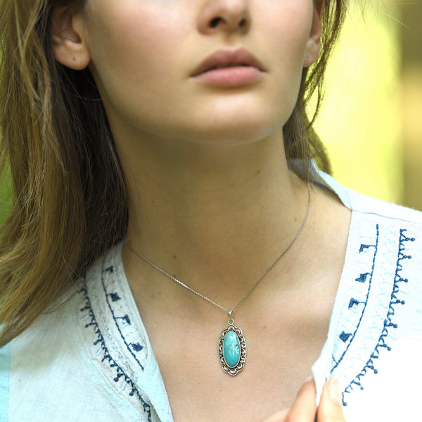 Mani Turquoise Pendant 7.57Ct And Sterling Silver