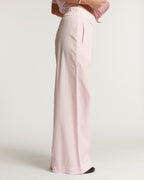 Wide pale pink poplin pants, fluid straight cut with high elasticated waist, ideal for a comfortable summer feminine style.