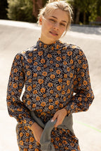 Blusa Bhumine