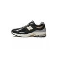 Zapatillas M2002 - Negro/Oro