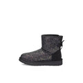 Botas Ugg Classic Mini Cosmos con lazo - Negro