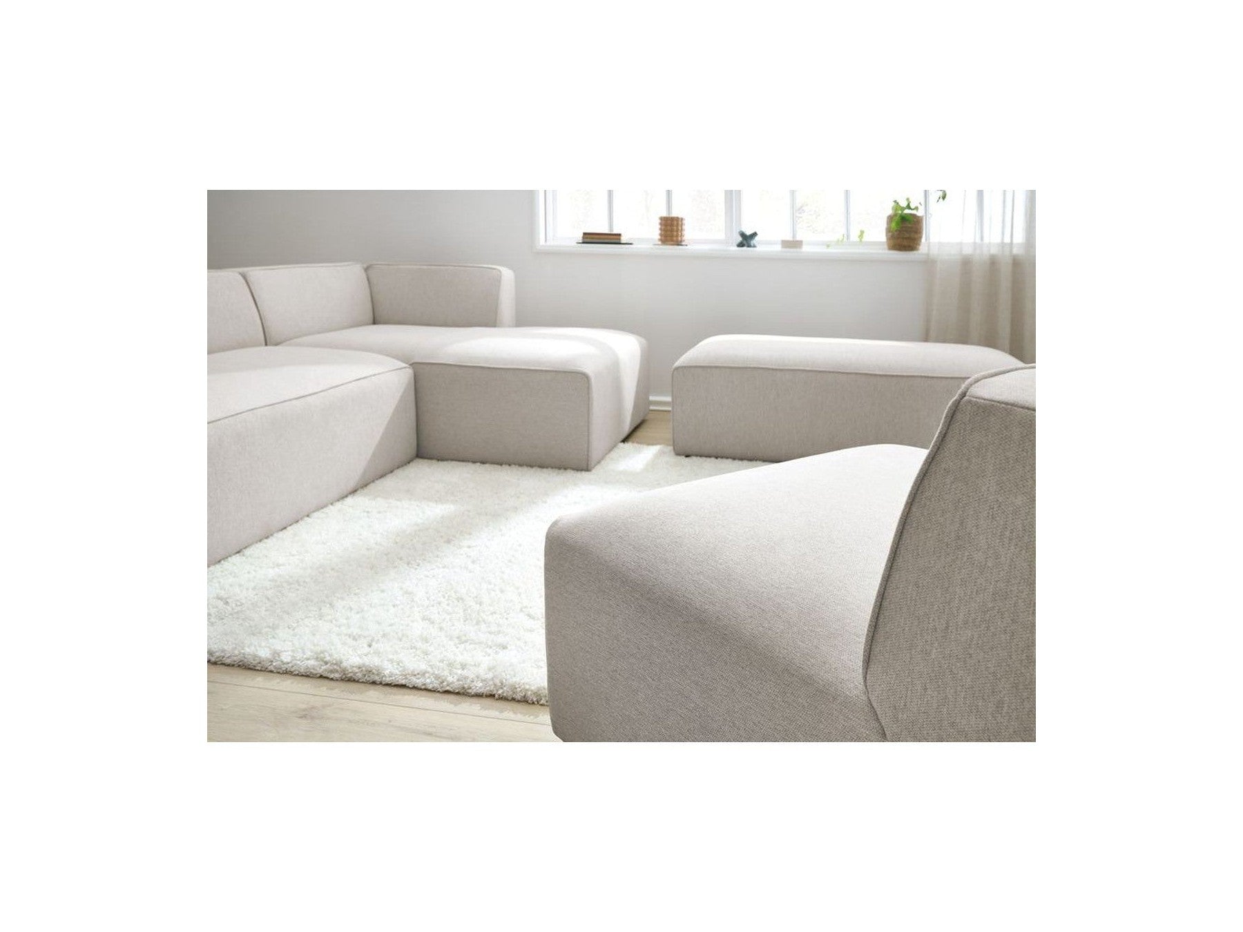 Megeve - Sofá esquinero fijo modular - Tejido liso con 1 módulo sin brazos y 1 puf - Esquina derecha