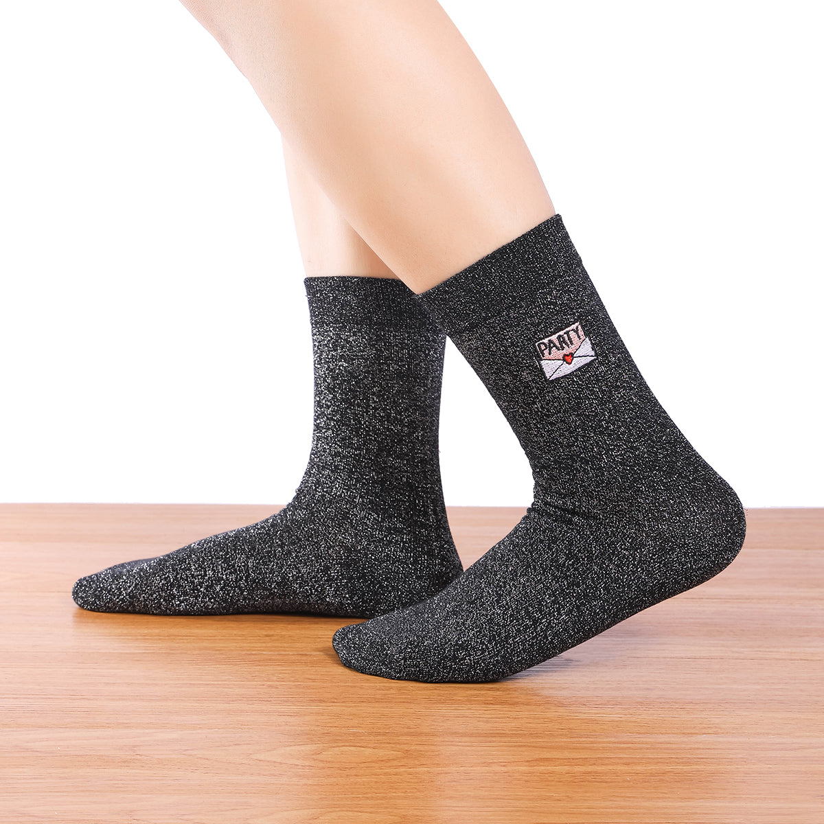 Silver black lurex knee high socks. Festive motif embroidered on the side: invitation heart envelope. 