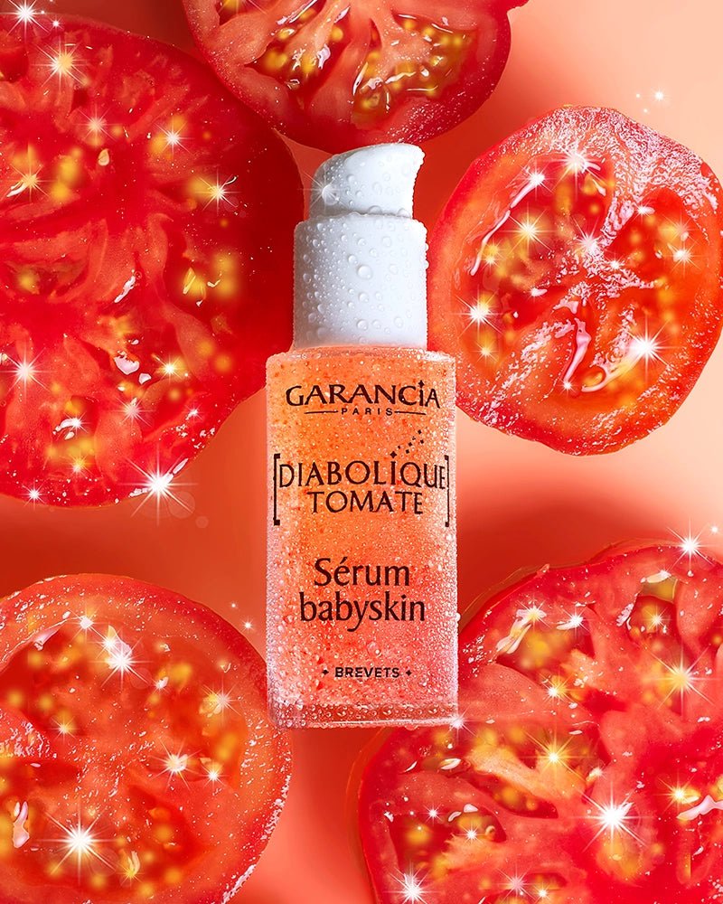 Producto diabólico suero de tomate babyskin con fondo de tomate