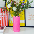 Pink tulip vase inside décor 