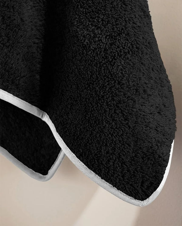 Lote de 4 toallas faciales - Negro con ribete blanco