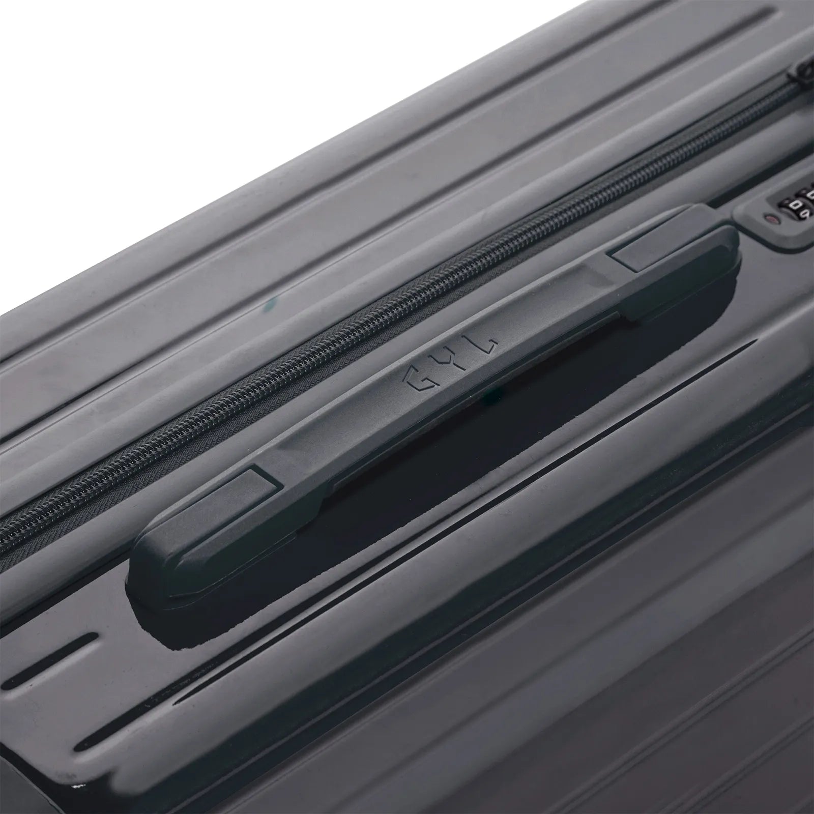 Asa superior rígida de la maleta GYL Intemporelle gris oscuro con logo en relieve en la parte superior. #couleur_gris foncé