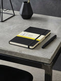 Cuaderno Clásico Mediano 11.5X18 - Páginas Cuadriculadas - Negro